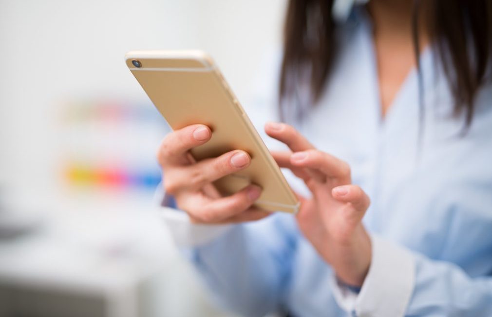Woman using her mobile phone