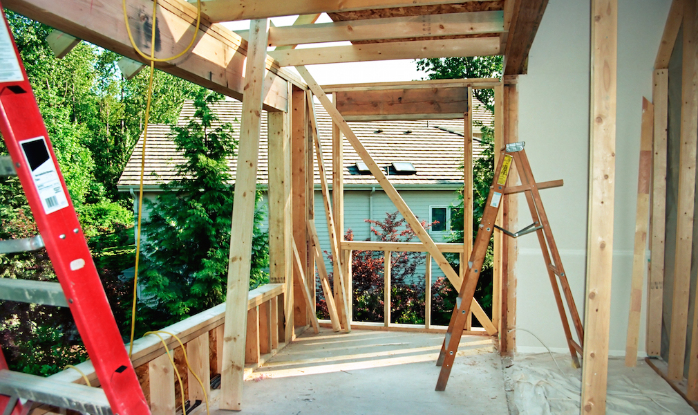 House-under-construction-frame-ladders