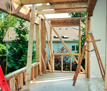 House-under-construction-frame-ladders