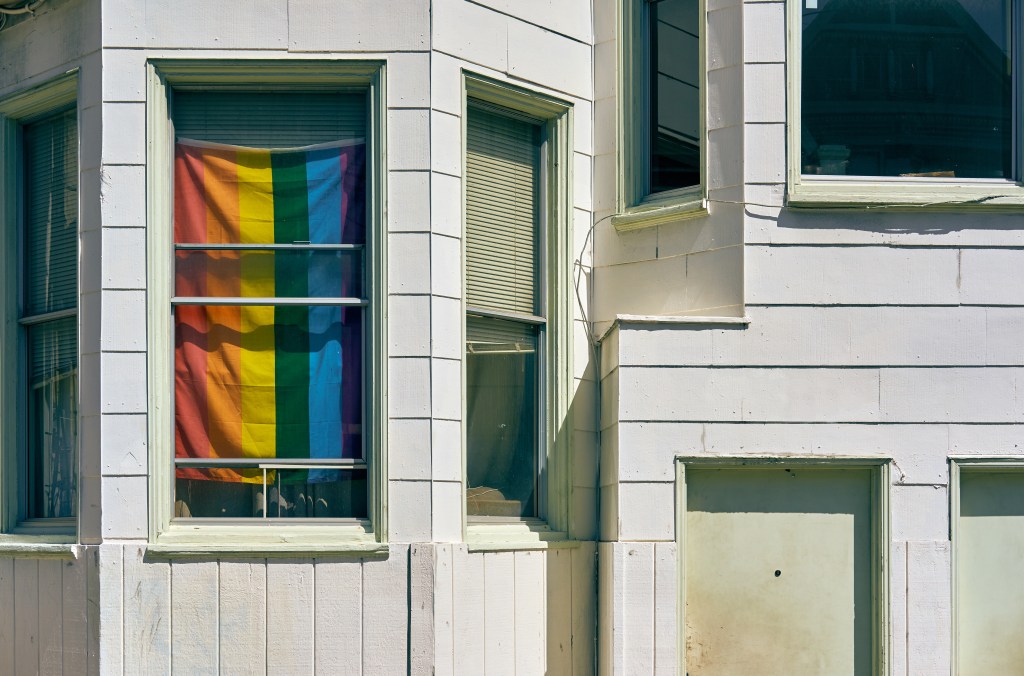 Rainbow flag in window