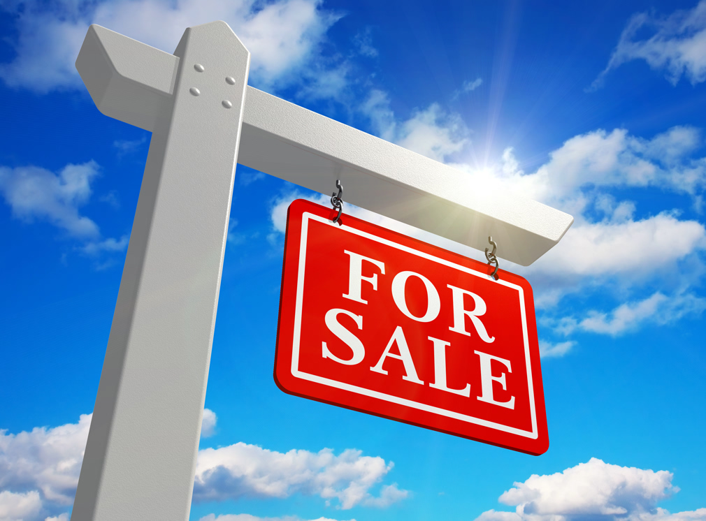 "For sale" real estate sign