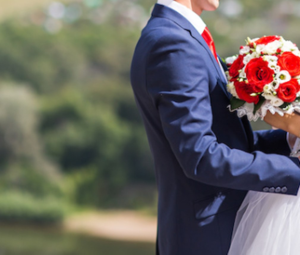 Bride and groom on their wedding day outdoors