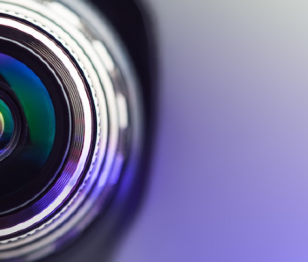 Banner. The camera lens with purple backlight. Optics.