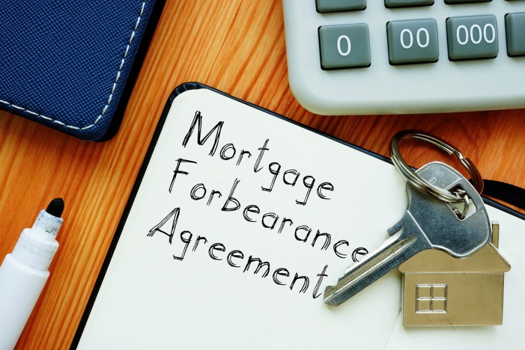 Mortgage Forbearance Agreement is shown on the conceptual business photo