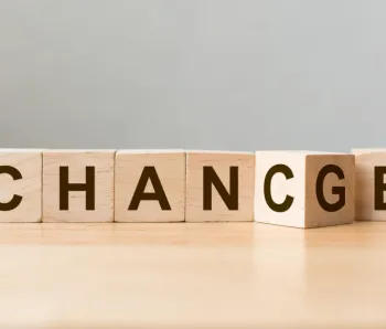Wooden cube flip with word "change" to "chance" on wood table, Personal development and career growth or change yourself concept