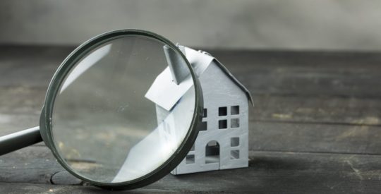House with Magnifying Glass