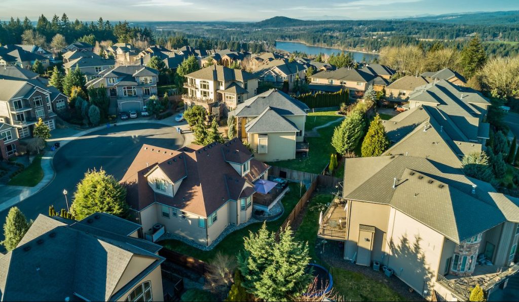 Beautiful luxury neighborhood in the Pacific Northwest photographed at sunset from the air