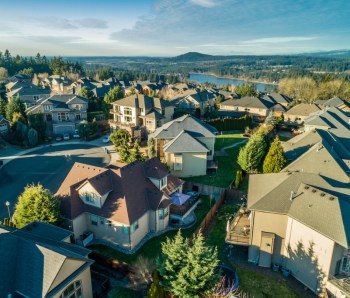 Beautiful luxury neighborhood in the Pacific Northwest photographed at sunset from the air