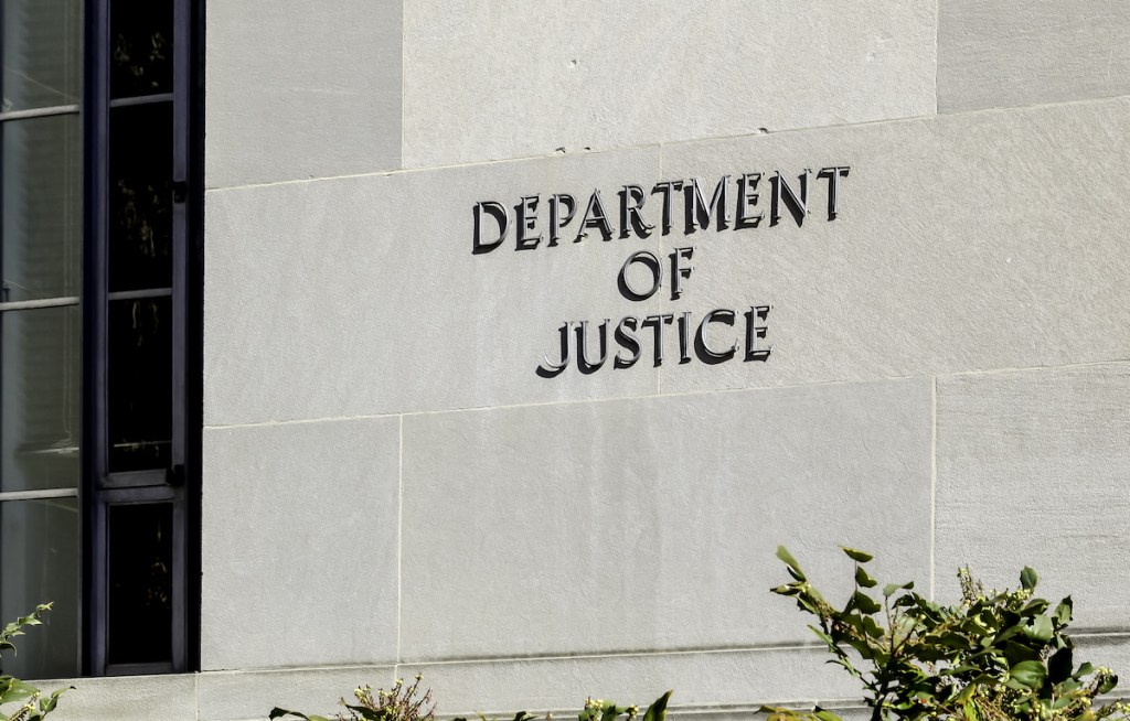 Washington D.C., USA - February 29, 2020: Sign of United States Department of Justice(DOJ) at its headquarters building in Washington, D.C. USA