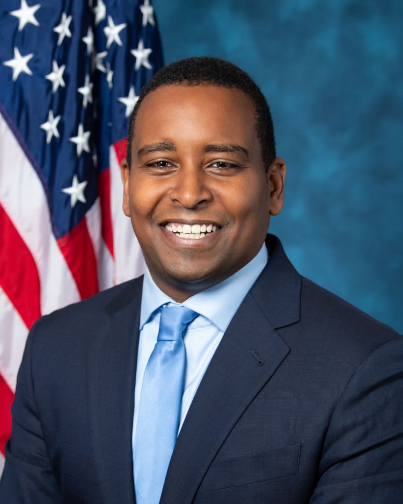 The official portrait of Rep. Joe Neguse from the 116th Congress.