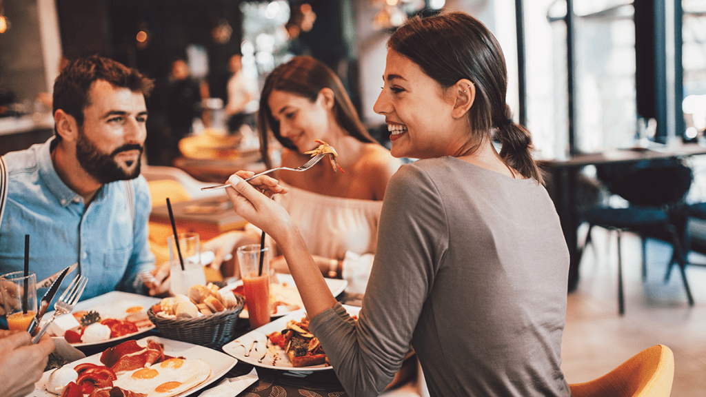 Young woman out for brunch with friends in a local restaurant