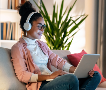 Woman listening to real estate podcast