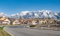 street view of middle income single-family home mountain neighborhood