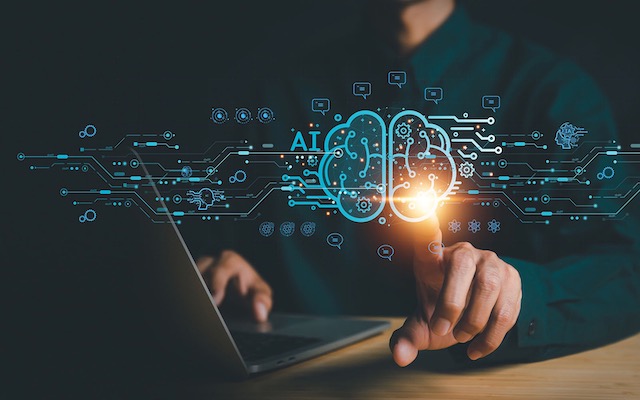 Chatbot chat AI concept, artificial intelligence Businessman using AI smart robot technology inputting commands to analyze data and build something. future technology changes.