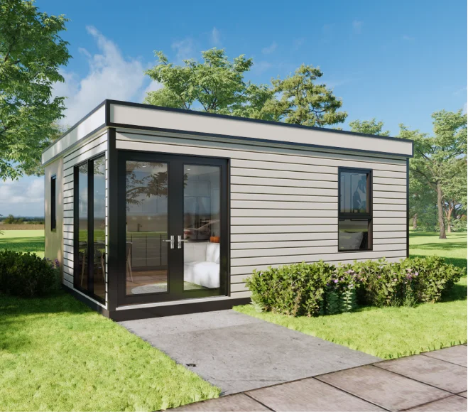 Exterior view of a cost-efficient single-family home at Eagle Ridge in Tehaleh, demonstrating sloped-lot grading to reduce construction costs, courtesy of ImageArts Productions and NHTI.